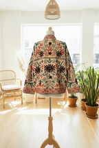 Chaqueta crema trasera maniquí boho